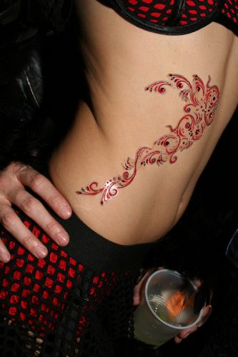 Flower Tattoos For Stomach. stomach tattoo designs.
