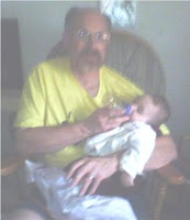 Grandpa feeding Ana