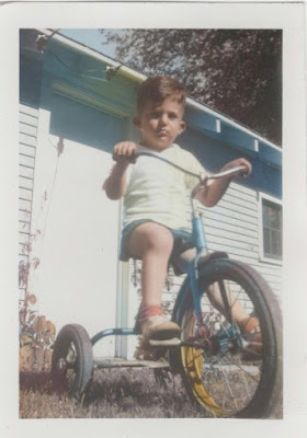 Young Wesley on his tricycle