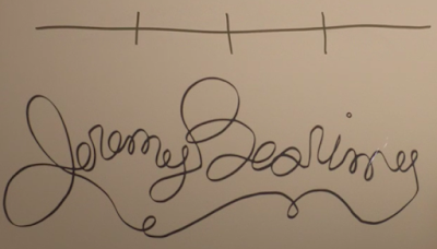 Near the top of the image, there's a straight line with three marks on it. Below that, there's a very loopy cursive version of the words "Jeremy Bearimy."