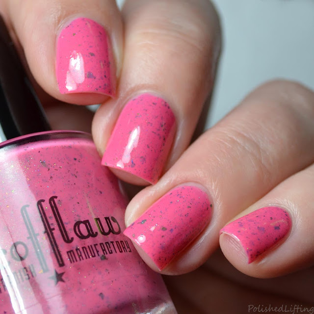 pink nail polish with flakies