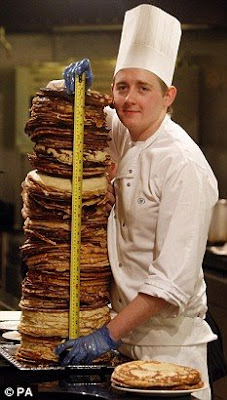 The leaning tower of egg and flour: Chefs claim world record with pancake skyscraper www.coolpicturegallery.net