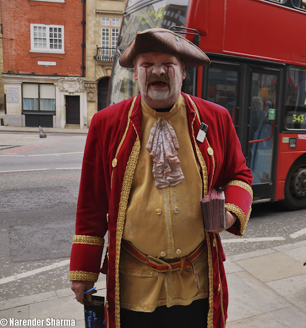 London Bus Tour with Narender Sharma !!! : London, though polluted and congested by UK standards, is a very interesting city in terms of heritage and history. While most of the city is full of things to do, the areas on the banks of the mighty river Thames is especially happening. One needs at least three days to explore the tourist attractions of London. The great Tower bridge over the river Thames. Many people confuse it with the London Bridge though the London bridge is not as magnificient.A statue of a horse and a rider in London, King Charles I I think. The city is dotted with magnificient statues and buildings that are mostly old.The Victoria memorial in the principle Faҫade in front of the Bucingham Palace.The Buckingham Palace, the abode of the Royal Family,  is usually a must visit sight on most of the 'Things to do in London' lists. However, one should visit the palace when the change of guard is scheduled otherwise, the place can be very boring.South Bank Lion Statue on the south side of the Westmster Bridge. Lions seem to the favorite animals along with horses of Londoners. There are lions on the Trafalgar square as well.The Tower bridge from the river.This is one of the beautiful building around London bridge !!!The Tower Bridge from a different angle.A beautiful lamp. As I said earlier, one cannot visit London and not be in awe of how much attention has gone into designing everything.Such sights about in London with places like London Dungeon being major attractions. This man is perhaps an artist who works in one such establishment. There is supposed to be an exhibition inside the towers that also provides a magnificient view of the city from a height.Bus Tour really helps knowing London’s famous landmarks and reveals London’s colorful history of 2000 years.There are many Bus tours available in London and many of them offer a choice of a recorded commentary or a live commentary delivered by entertaining guides.Some of them have hop-on, hop-off facility which enables to get on and off the bus at may places of interest...There are some nice offerings with inclusion of free cruise on the river Thames and sometimes food vouchers etc....Beautiful Architecture of London in various possible color shades makes the city more attractive... It's rare to see such colorful architecture !!!Trying to click self-portrait in a beautiful Mirror !!!Dispersed light through a wall-light...Bus Tour really helps knowing London’s famous landmarks and reveals London’s colourful history of 2000 years. There are many Bus tours available in London and many of them offer a choice of a recorded commentary or a live commentary delivered by entertaining guides.Some of them have hop-on, hop-off facility which enables to get on and off the bus at many places of interest...There are some nice offerings with inclusion of free cruise on the river Thames and sometimes food vouchers etc....Here are some of the main places these buses cover in London -- The Tower of London- St Paul's cathedral- The London Eye- Buckinggham palace- Tower Brige- Trafalgar Square- Piccadily Circus- Westminster Abbey- Downing Street- Horse Guards