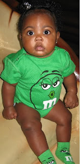 green M&M onesies, viktorviktoriashop.com