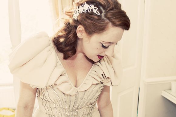 A stunning 1940s wedding dress altered by the bride to be backless