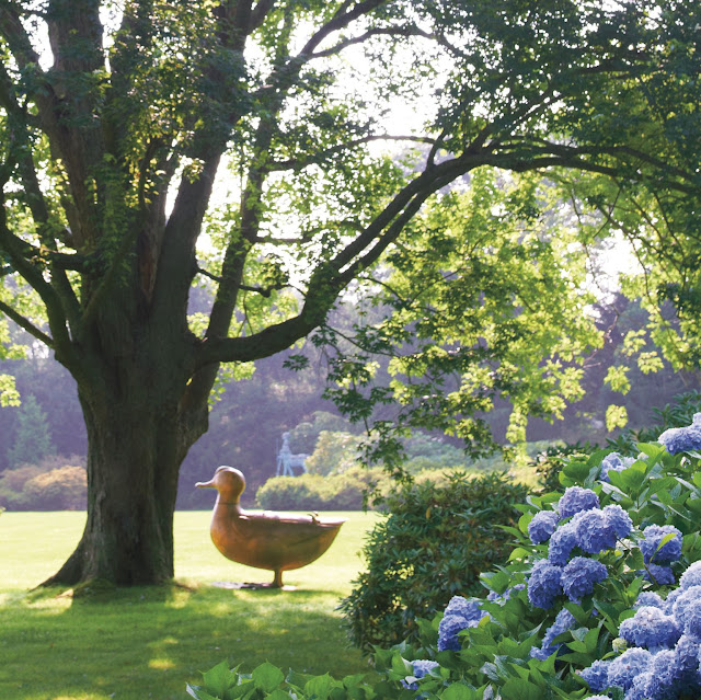 Hamptons garden of Peter Marino with Lalanne duck sculpture