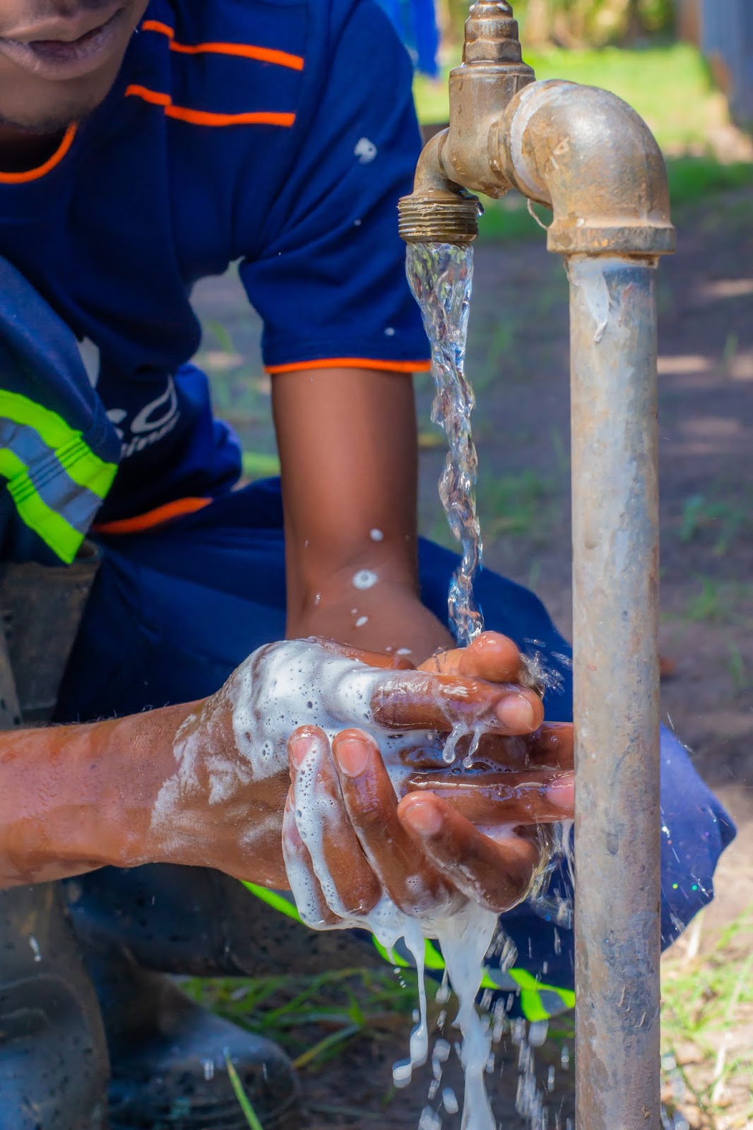 Handwashing: Clean Hands Save Lives (Ray Vines Washes Hands with Nakiso Borehole Drilling)