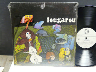 Garolou"Lougarou"1976 +"Garolou"1978 + "Romancero"1980 +"Centre-Ville"1982 + "Réunion"1997 +"Réunion"1997 +"Mémoire Vive"1999 Canada Prog Folk Rock
