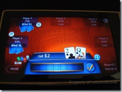 Playing Texas Hold 'Em on the Zune HD.