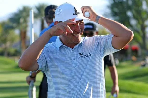 Rico Hoey of the Philippines reacts to his round as he walks off the 18th green during the second round of The American Express 2025 at the Nicklaus Tournament Course on January 17, 2025, in La Quinta, California. Photo by Joe Scarnici/Getty Images