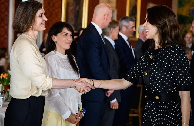 Crown Princess Mary wore a polka-dot pleated dress by Prada. Crown Princess Mette-Marit and Crown Prince Haakon