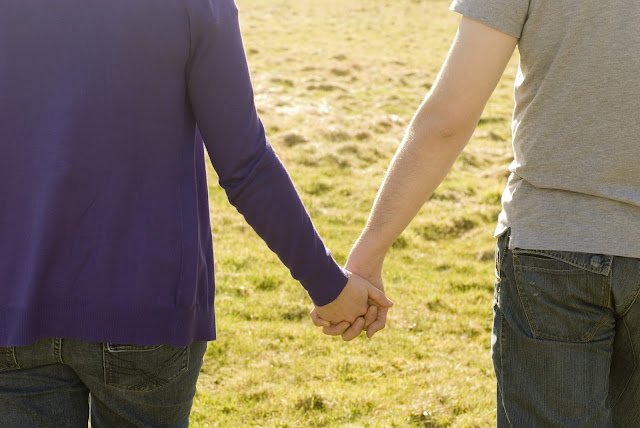 couple holding hands