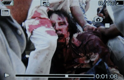 Wounded Gaddafi