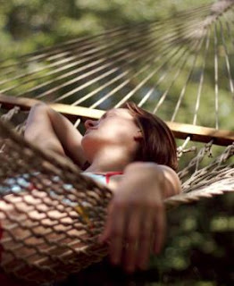 woman napping in hammock