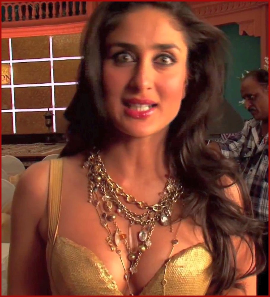 An excited Kareena Kapoor jeweled up in a golden bikini top