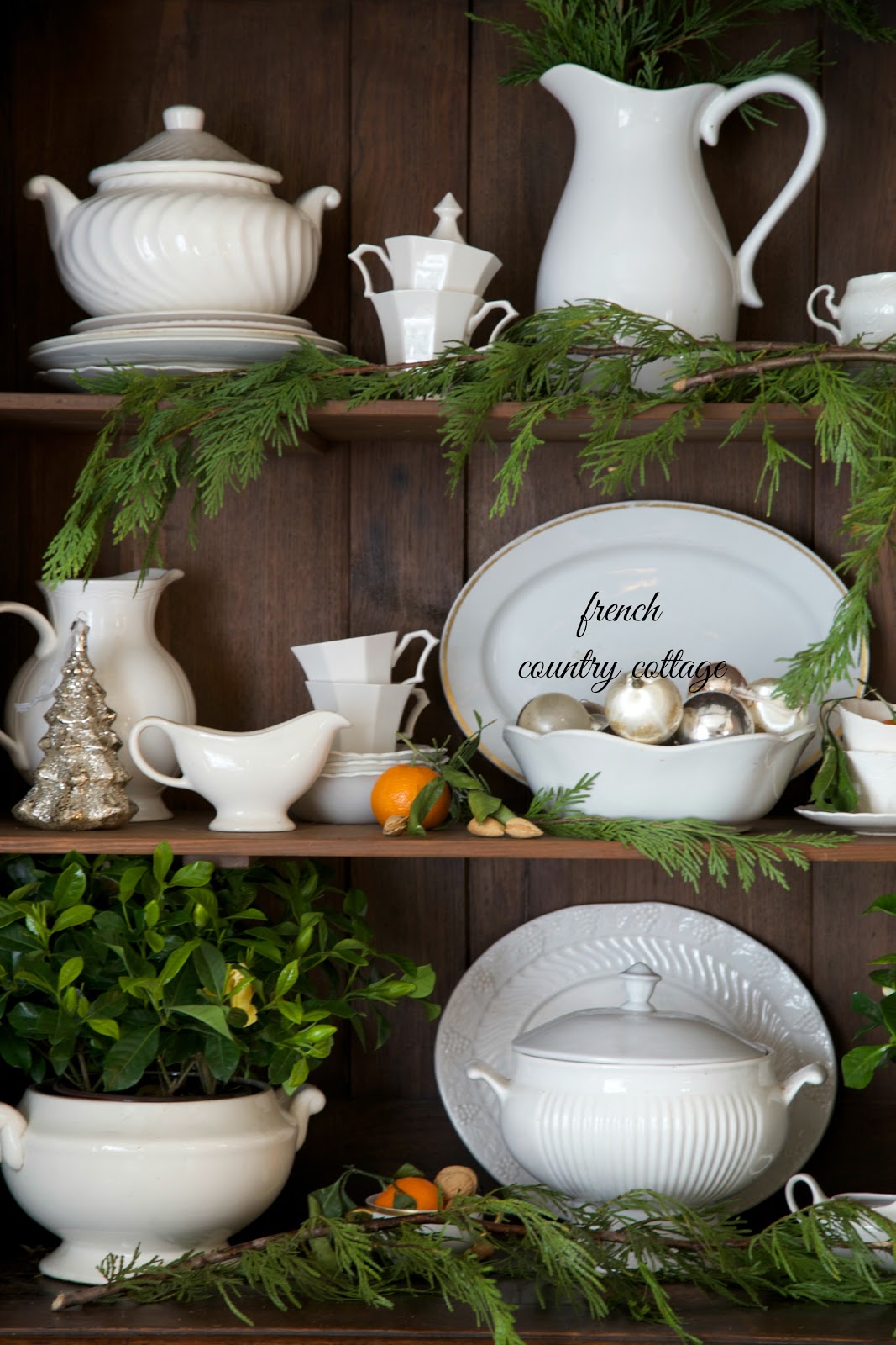 Display of ironstone for Christmas from French Country Cottage | Friday Christmas Favorites at www.andersonandgrant.com