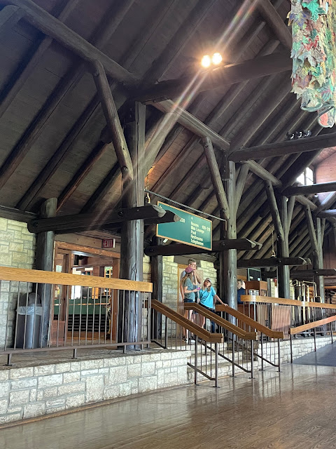 color photo of log beams inside main room of Pere Marquette lodge Grafton Illinois