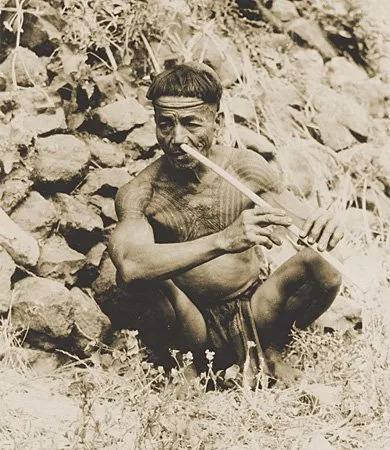 Bontok man playing native nose flute