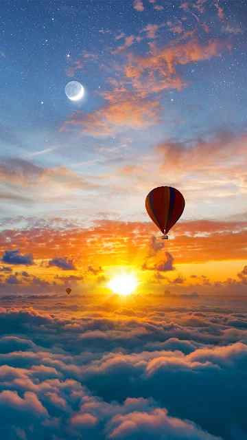 Colorful Hot Air Balloon Flying above the Clouds Wallpaper for iPhone