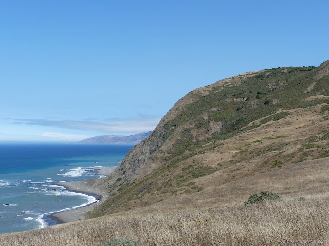 land dropping to the beach