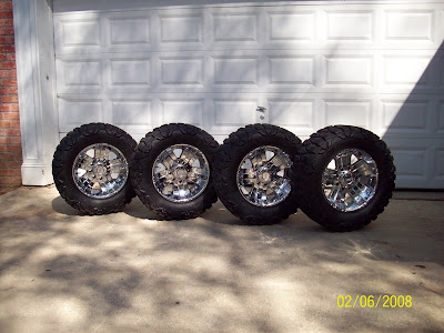   Tire on Racing Rims Wrapped With 33 Inch Nitto Mud Grappler Tires Tires