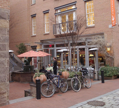 men enjoying cafe riding bikes bicycles