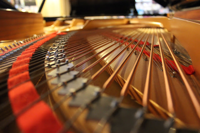 piano strings of 9-foot Yamaha concert grand