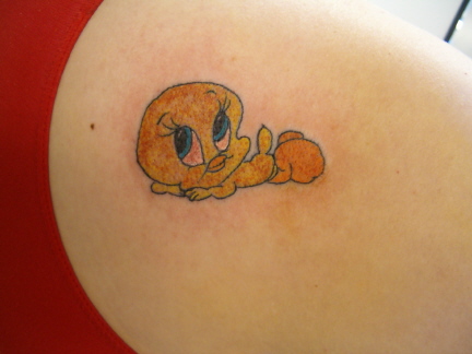 Tweety Bird tattoo on back.