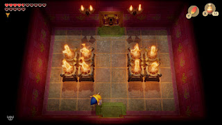 Link at in the room before the boss of the Face Shrine. Torches are lit, but no fairies have appeared. There is a boss symbol in the bottom left corner of the screen.