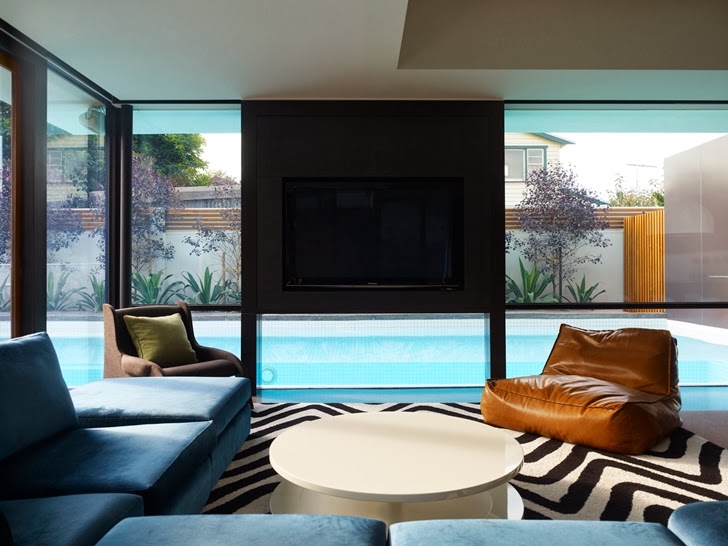 Living room in Dark Contemporary Home by Steve Domoney Architecture