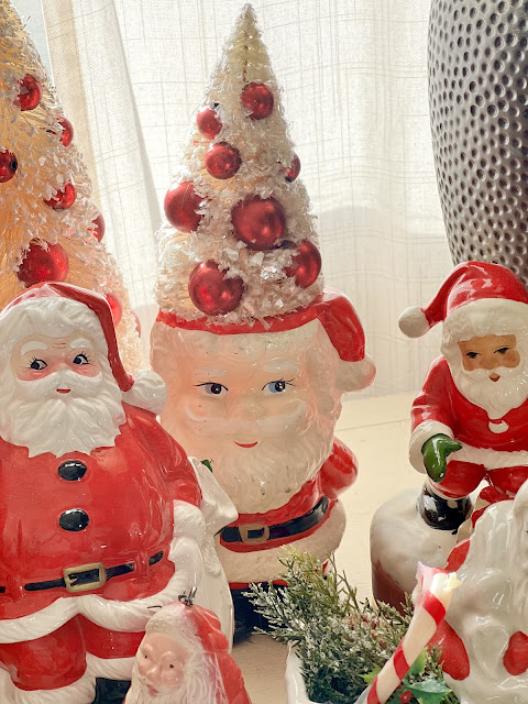 Vintage Ceramic Santa display featuring Three different style vintage Santas