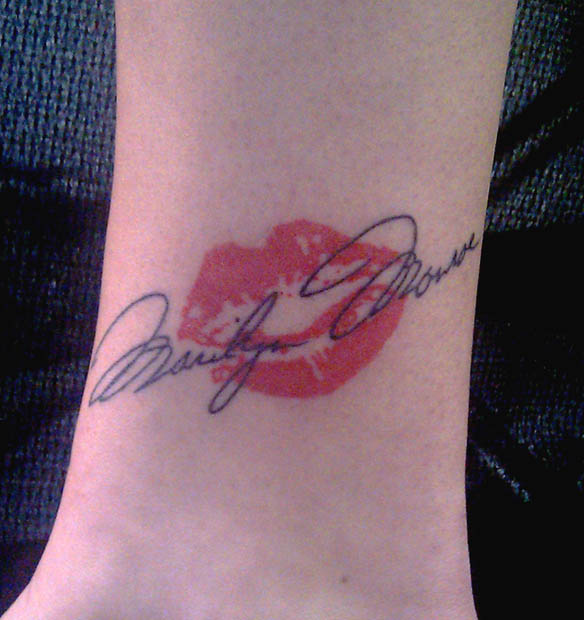 Tattoo; Black and Red, tattoo of lips. Tattoo; Black and Red,