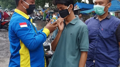 DPK KNPI Medan Deli Bagi Masker dan Sabun Cuci Tangan 150 Paket