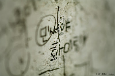 Small writings in Korean on a wall