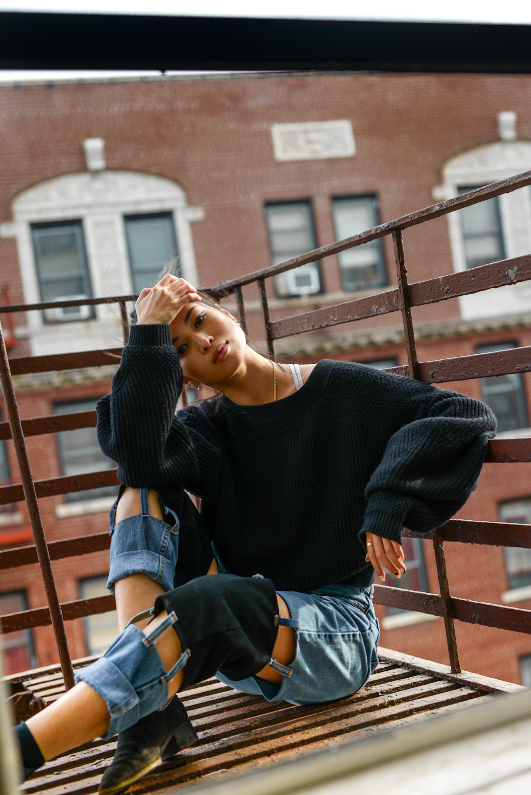 Fire escape fashion editorial, sustainable denim brand, AndAgain NYC, recycled jeans, colorblocked denim, New York personal style blogger, New York City lifestyle - Press to Resume / 012019 - FOREVERVANNY.com