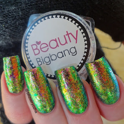 Beauty Bigbang, Iridescent Chameleon Flakes, J2443-9A, over black polish