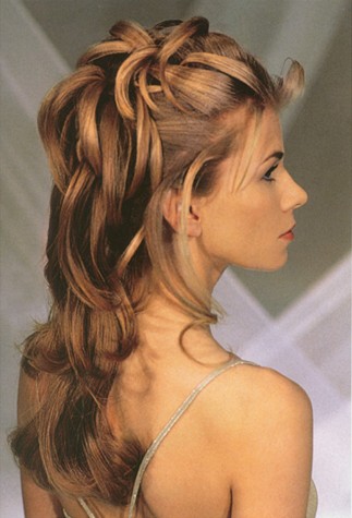 Elizabeth Hurley hairstyle with tiara.