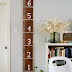 Photographing a toddler in front of a growth chart