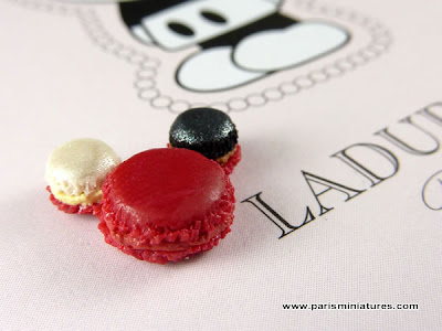 Miniature Mickey Macaroon by Emmaflam and Miniman shown on the full sized Ladurée box