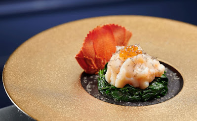 Source: Mandarin Oriental. Sauteed lobster with superior fish broth is a Man Wah signature dish.