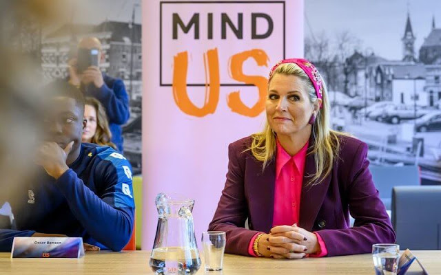 Queen Maxima wore a tailored double-breasted purple blazer suit by Zara. NamJosh geometric embellished pink headband