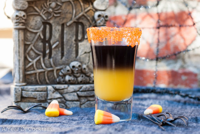 black vodka, orange juice, layered shot, halloween cocktail