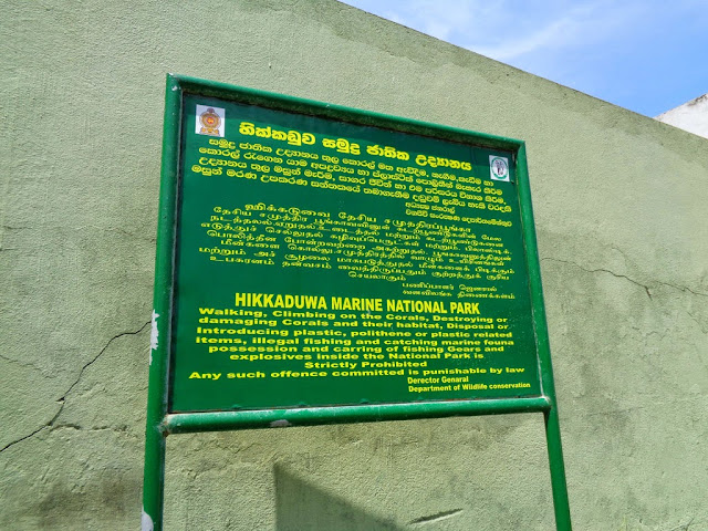 Hikkaduwa beach name board