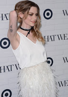 Jaime King in feather skirt over a silk white top paired at the Who What Wear x Target Launch Party red carpet dress