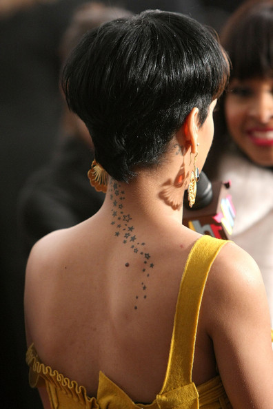 star tattoos behind your ear. Celebrities Rihanna With Stars