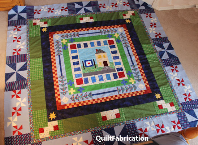 seven different borders on a round robin quilt