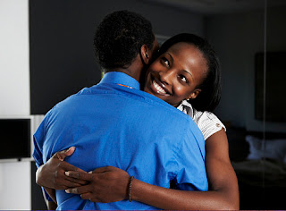 black_woman_embraces_black_man