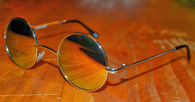 http://www.shopzerouv.com/collections/womens-sunglasses-1/products/retro-lennon-style-round-circle-metal-mirror-lens-sunglasses-1408
