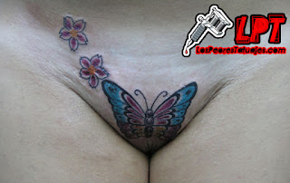 tatuaje de mariposa en la vajina