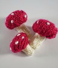 http://www.ravelry.com/patterns/library/woodland-wreath-toadstools